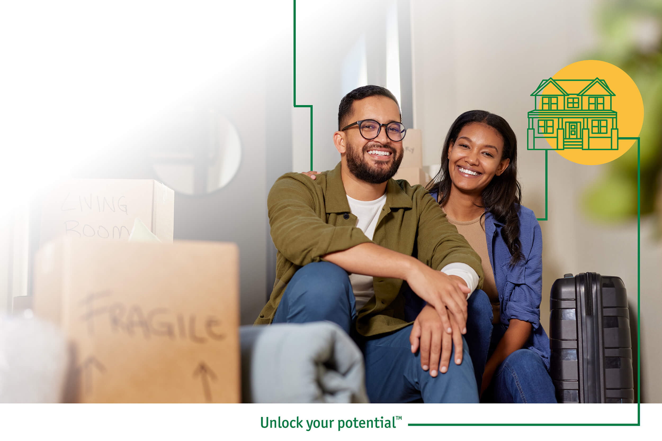 A couple sitting in a room with their luggage ready to apply for a new home loan.